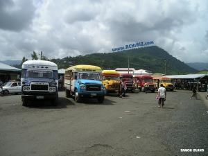 Parked buses with hills view at Samoa